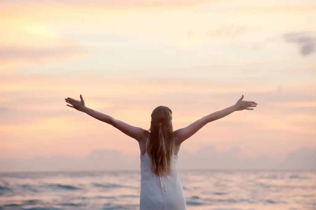 girl raised hands